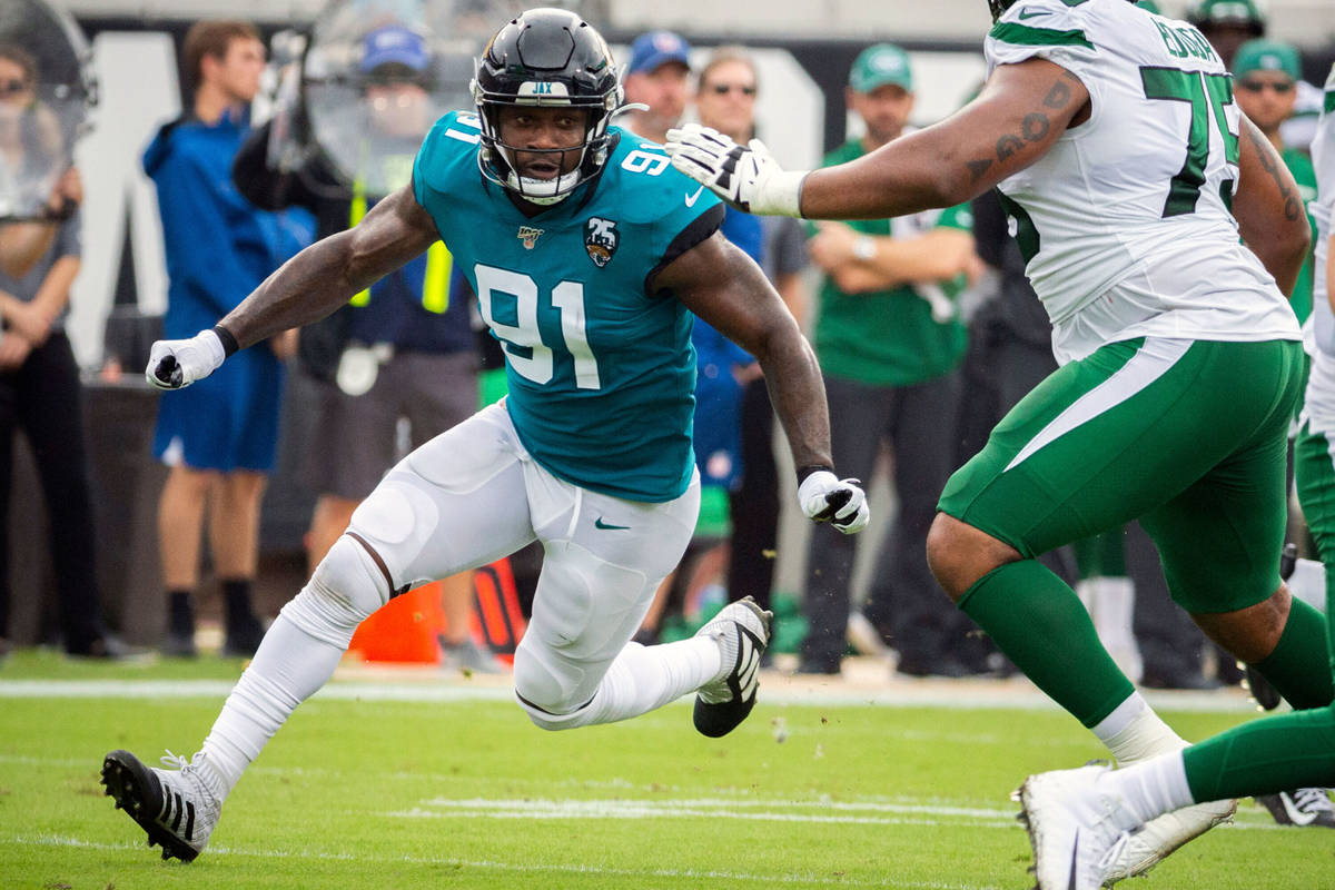 FILE - In this Oct. 27, 2019, file photo, Jacksonville Jaguars defensive end Yannick Ngakoue (9 ...