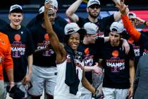 FILE - Illinois guard Ayo Dosunmu (11) celebrates after being named tournament MVP after defeat ...