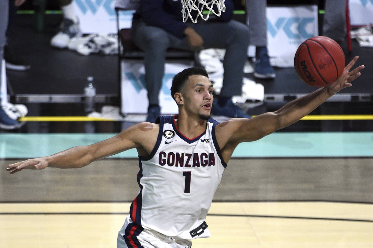 Gonzaga guard Jalen Suggs grabs a rebound against Saint Mary's during the second half of an NCA ...
