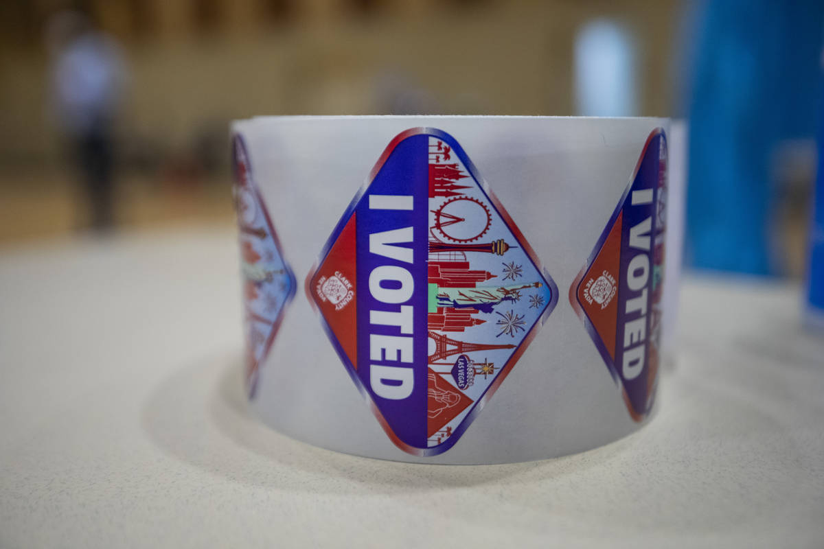 Stickers are seen at the Historic Fifth Street School polling station nearing the station's clo ...