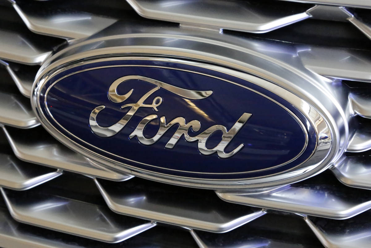 A Feb. 15, 2018, file photo shows a Ford logo on the grill of a 2018 Ford Explorer on display a ...