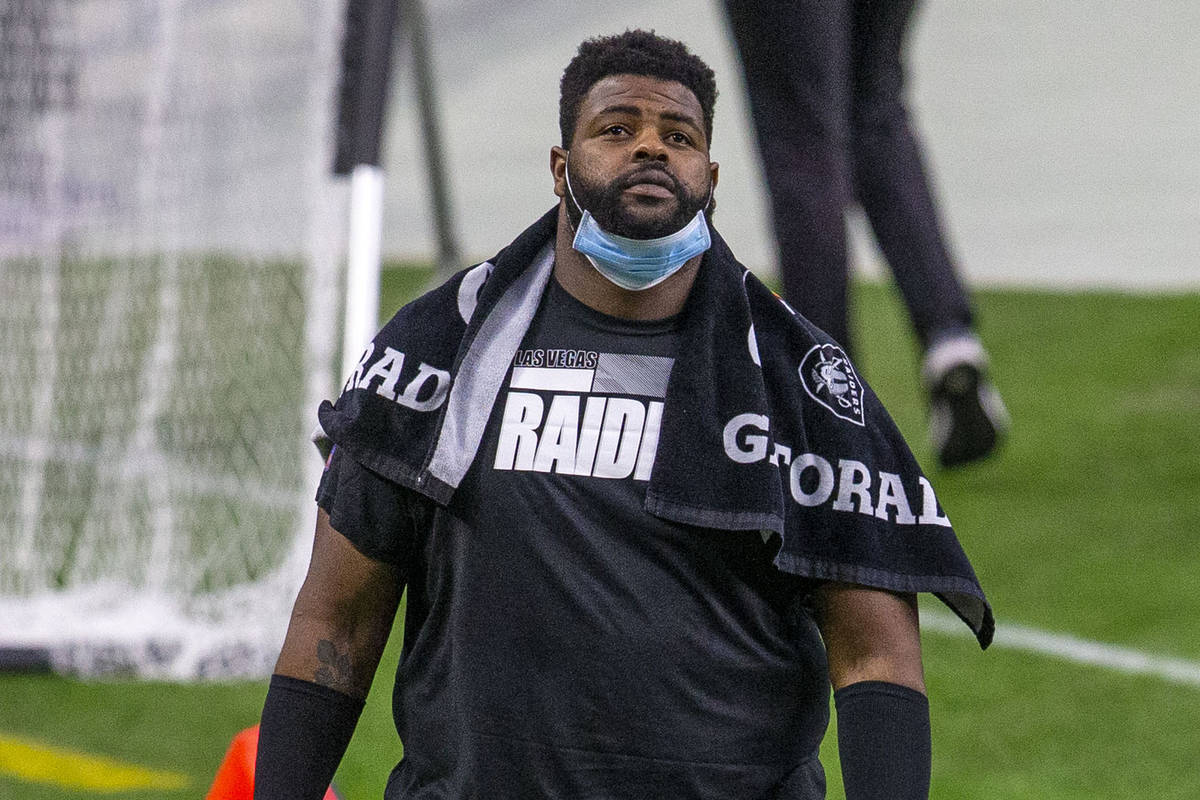 Raiders defensive tackle Johnathan Hankins walks on the sideline before an NFL football game ag ...