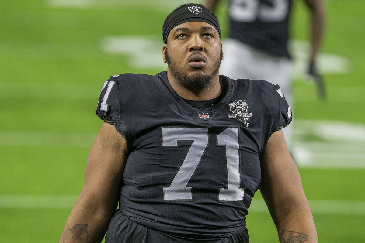 Raiders offensive guard Denzelle Good (71) warms up before an NFL football game against the Mia ...