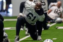 Las Vegas Raiders center Rodney Hudson (61) stretches during a practice session at the Intermou ...