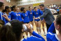 Bishop Gorman High School girls volleyball coach Gregg Nunley is shown with his team on Saturda ...