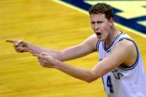 FILE - In this Feb. 17, 2001, file photo, Dallas Mavericks center Shawn Bradley reacts as he ar ...
