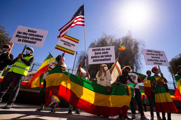 People demonstrate to highlight the humanitarian crisis in the Tigray region of Ethiopia outsid ...