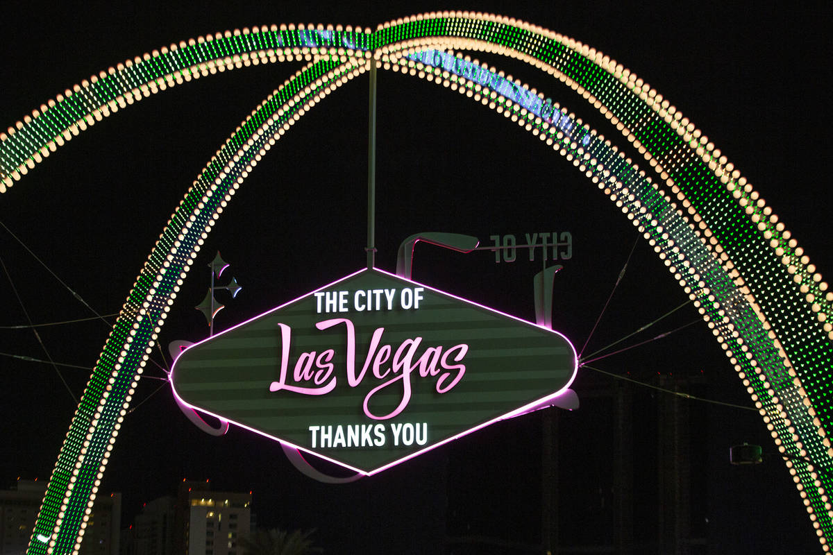 The Las Vegas Boulevard Gateway Arches are lit green for St. Patrick's Day on Wednesday, March ...
