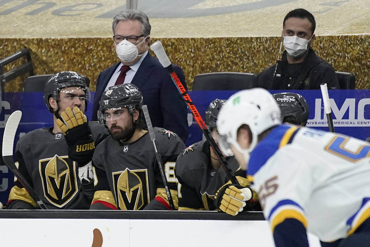 Vegas Golden Knights general manager Kelly McCrimmon, back left, coaches against the St. Louis ...