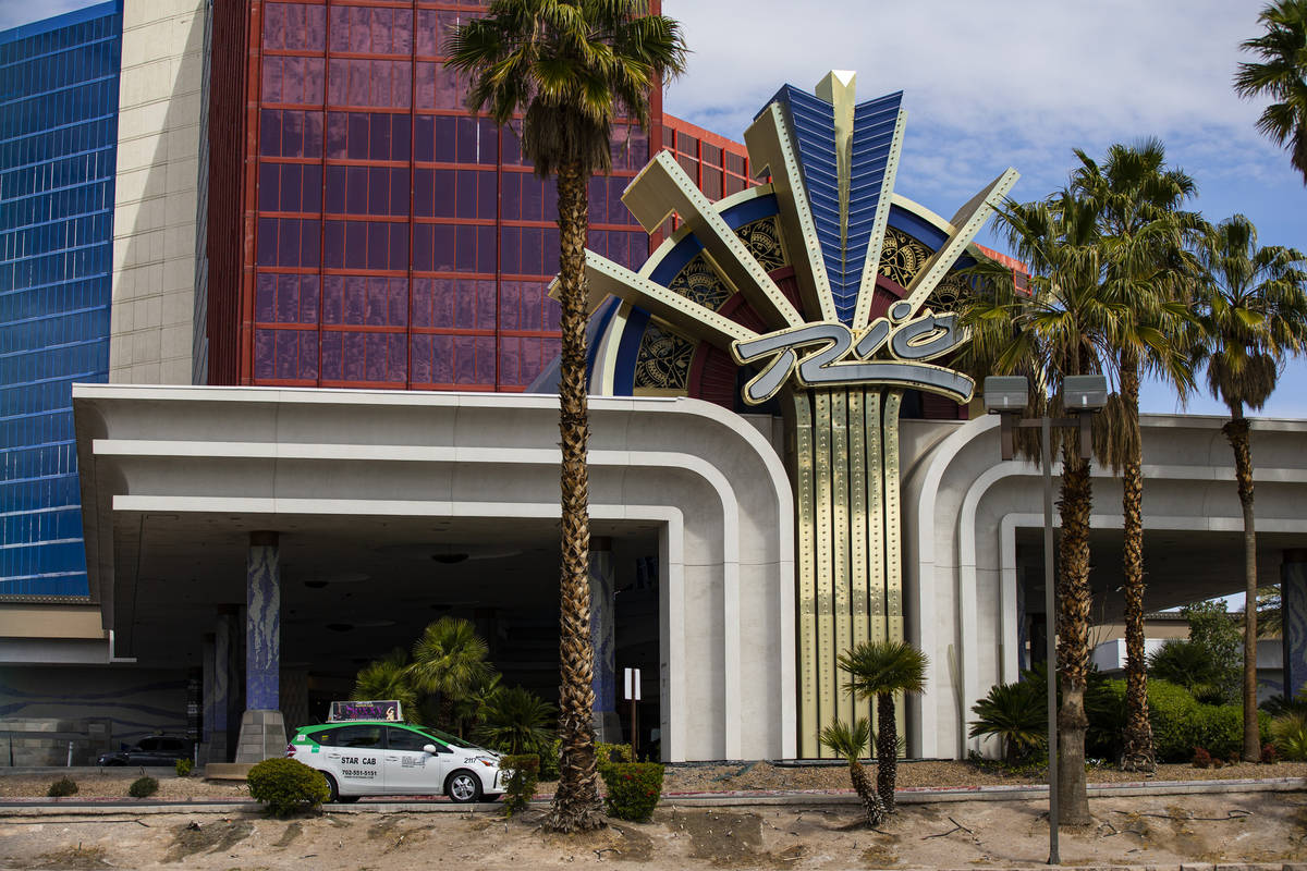 A taxi passes by a porte-cochere at the Rio, which is slated to undergo a renovation in partner ...