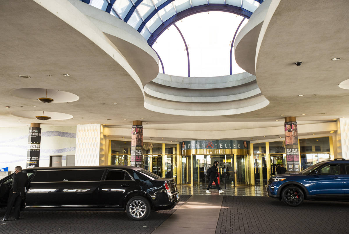 A man walks by in the valet area below the porte-cochere of the Rio, which is slated to undergo ...