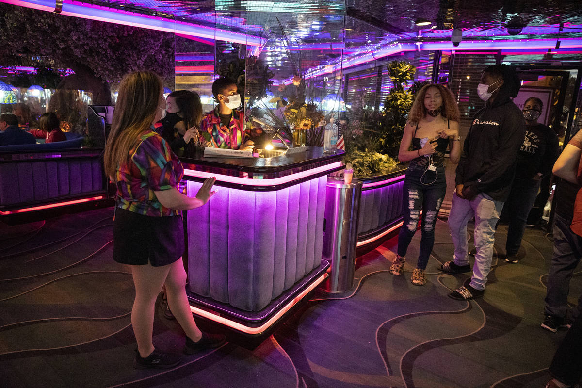 People wait in line to reserve a table at Peppermill Las Vegas on Friday. (Erik Verduzco / Las ...
