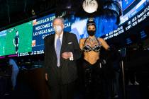 Former Las Vegas Mayor Oscar Goodman leaves Westgate Superbook with showgirl Jennifer Gagliano ...