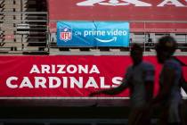 FILE - In this Saturday, Dec. 26, 2020, file photo, An 'NFL on prime video' banner hangs on the ...