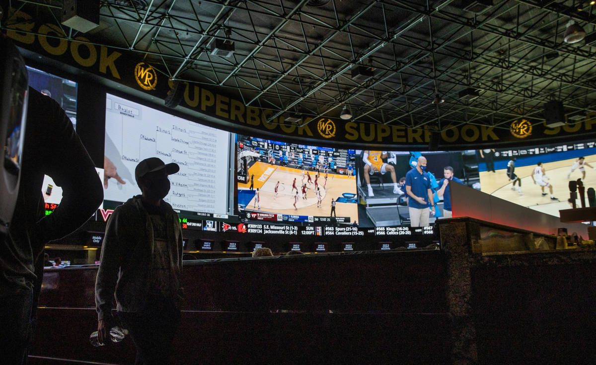 The scenes above show a variety of games and more during opening day of NCAA Tournament play at ...