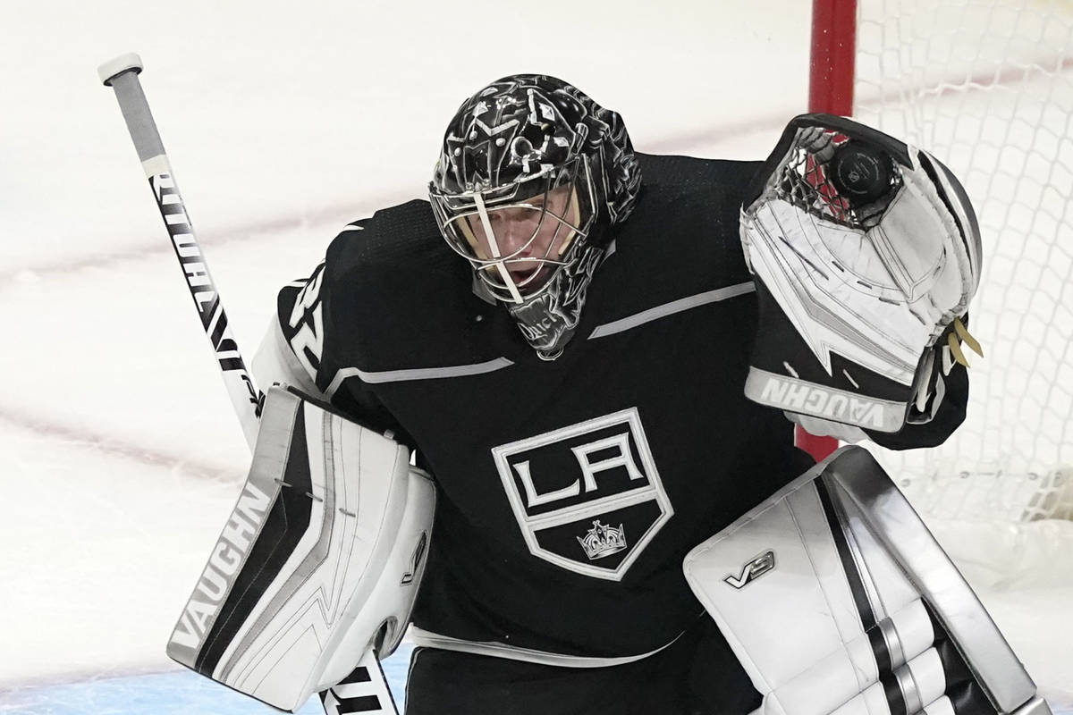 Los Angeles Kings goaltender Jonathan Quick stops a shot during the first period of the team's ...