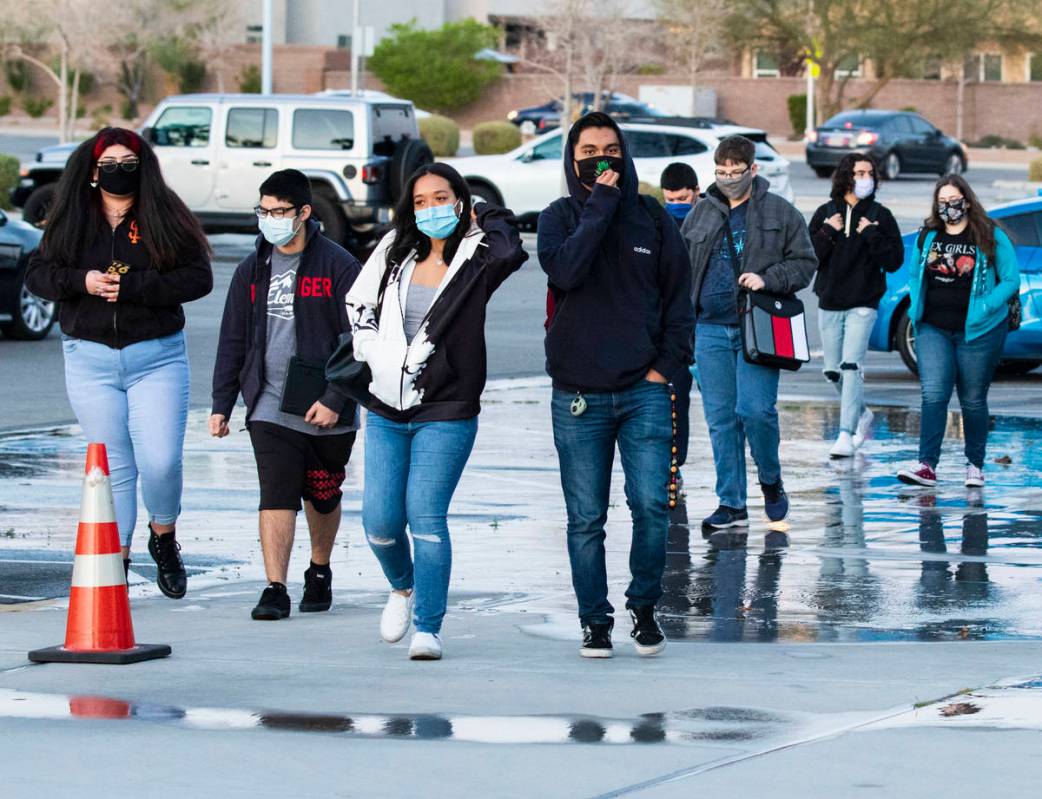 Students arrive at Liberty High School, on Monday, March 22, 2021, in Henderson. The next group ...