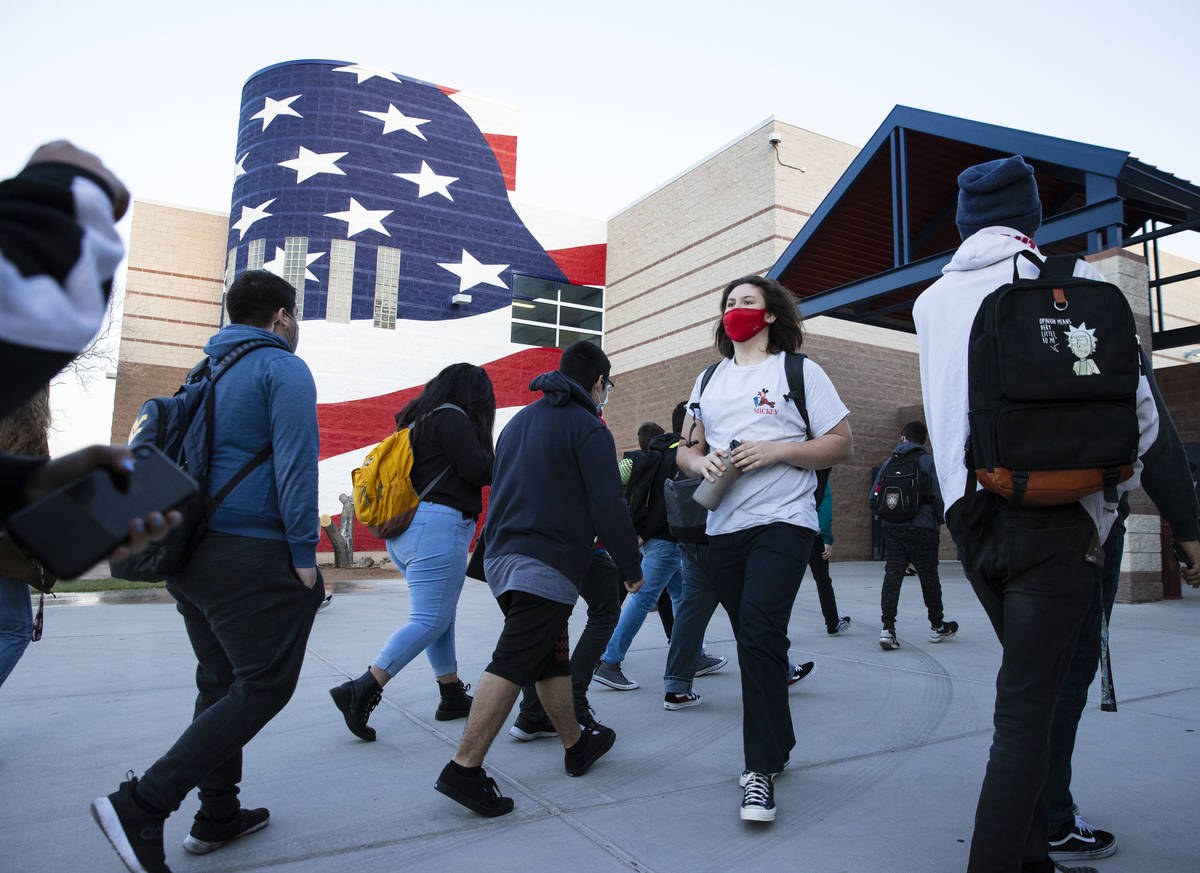 Students arrive at Liberty High School, on Monday, March 22, 2021, in Henderson. The next group ...