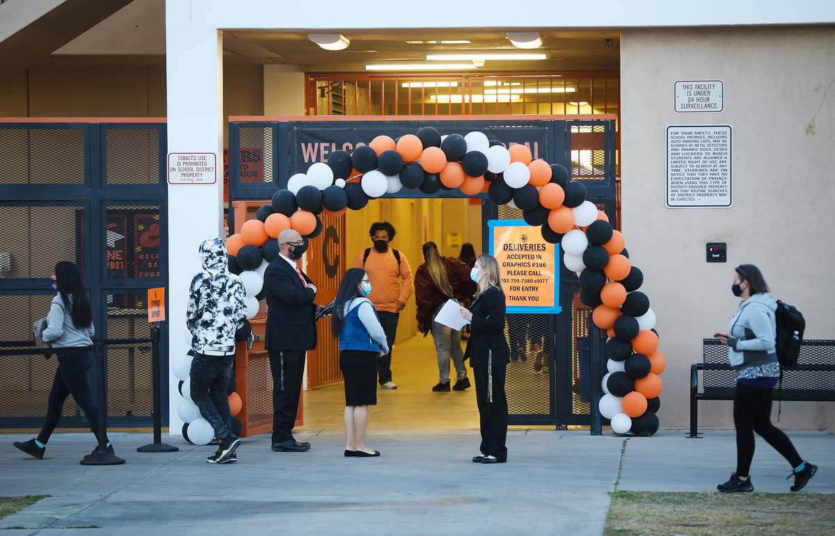 Students enter Chaparral High School in Las Vegas Monday, March 22, 2021. The next group of Cla ...