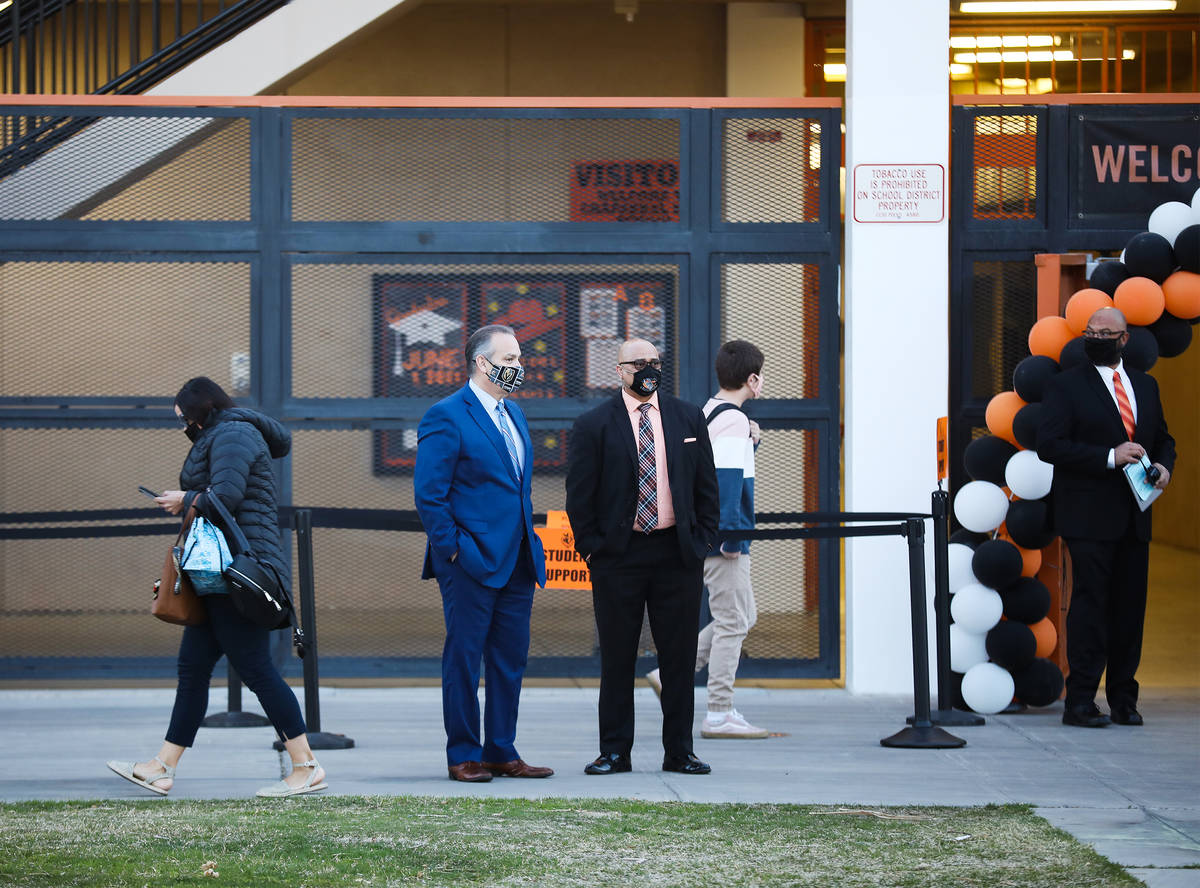 Clark County School District Superintendent Jesus Jara, left, stands next to Chaparral High Sch ...