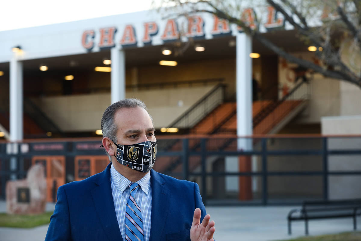 Clark County School District Superintendent Jesus Jara addresses media outside Chaparral High S ...