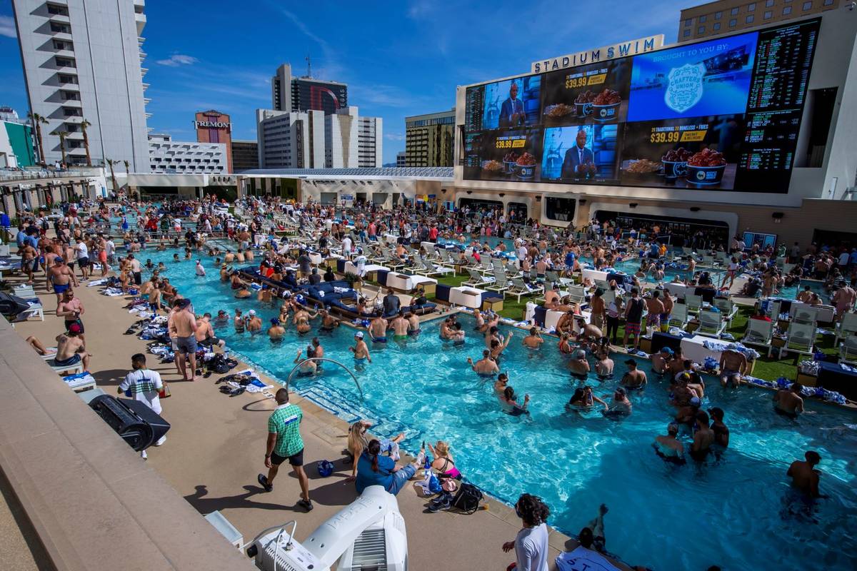 The pools and decks are crowded in Stadium Swim at the Circa on Friday, March 19, 2021. (L.E. B ...