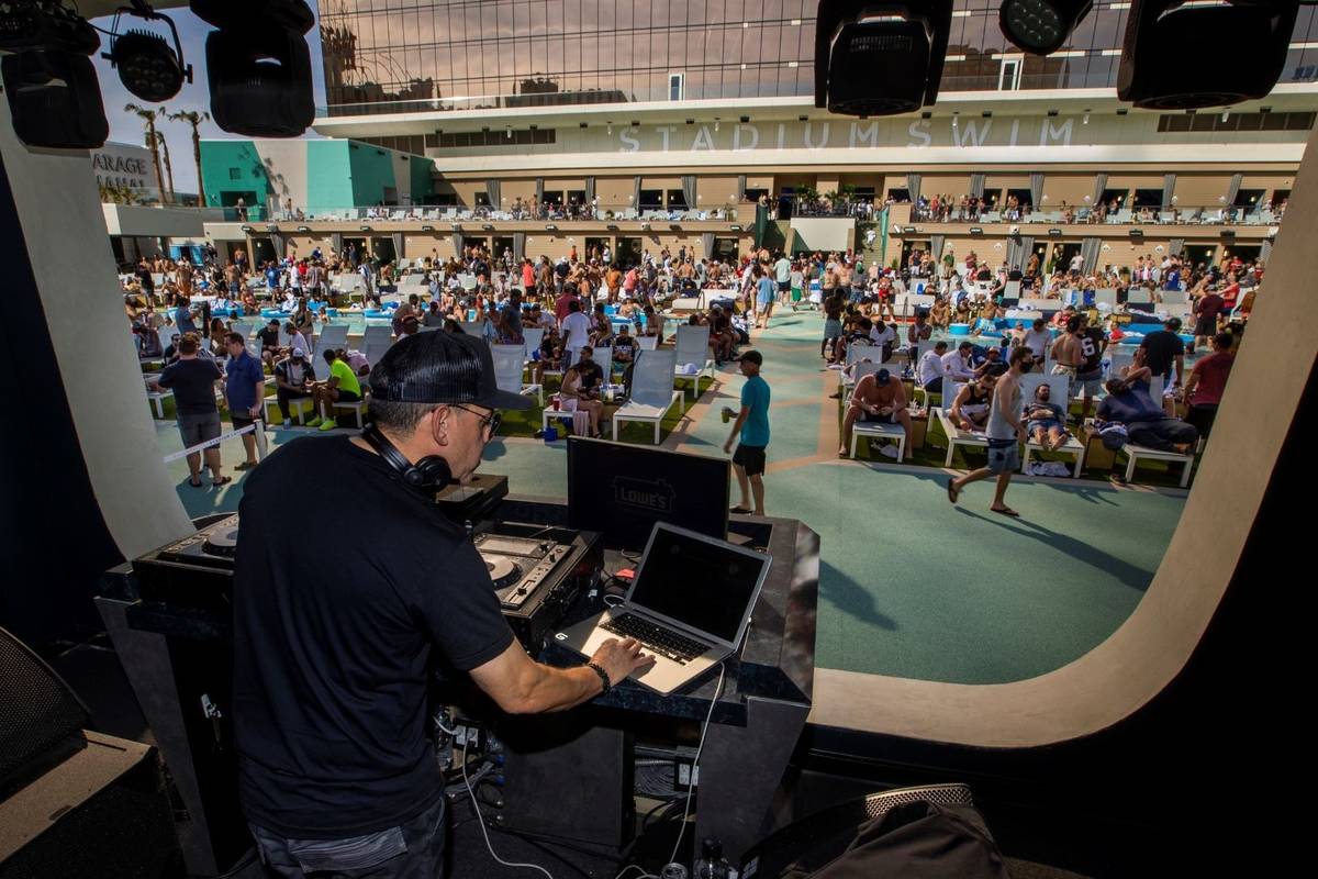 The pools and decks are crowded in Stadium Swim at the Circa on Friday, March 19, 2021. (L.E. B ...