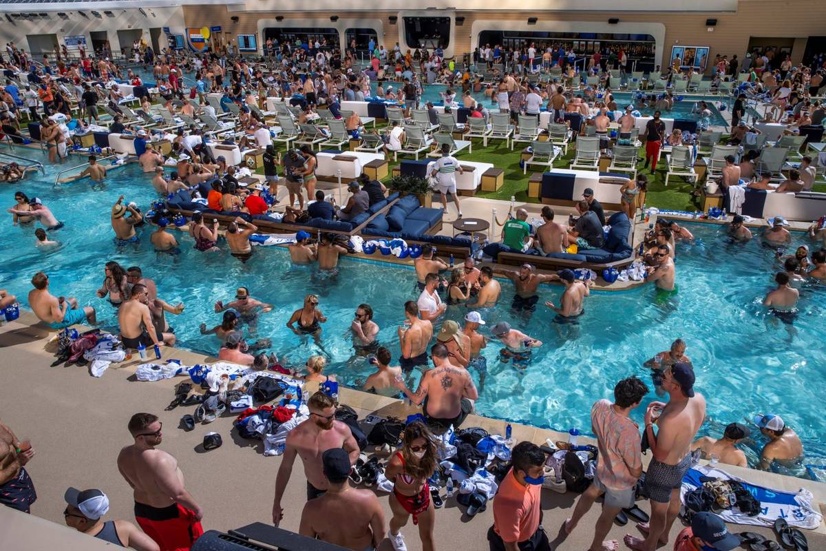 The pools and decks are crowded in Stadium Swim at the Circa on Friday, March 19, 2021. (L.E. B ...