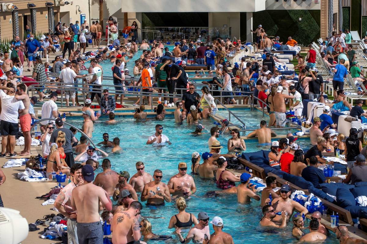 The pools and decks are crowded in Stadium Swim at the Circa on Friday, March 19, 2021. (L.E. B ...