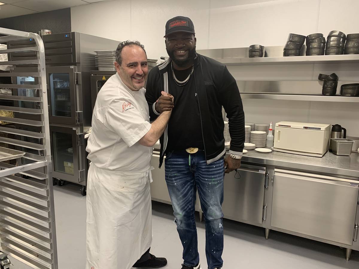 Chef Barry Dakake and David "Big Papi" Ortiz are shown at Circa on Thursday, March 18, 2021. (C ...