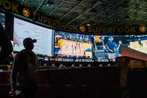 The scenes above show a variety of games and more during opening day of NCAA Tournament play at ...