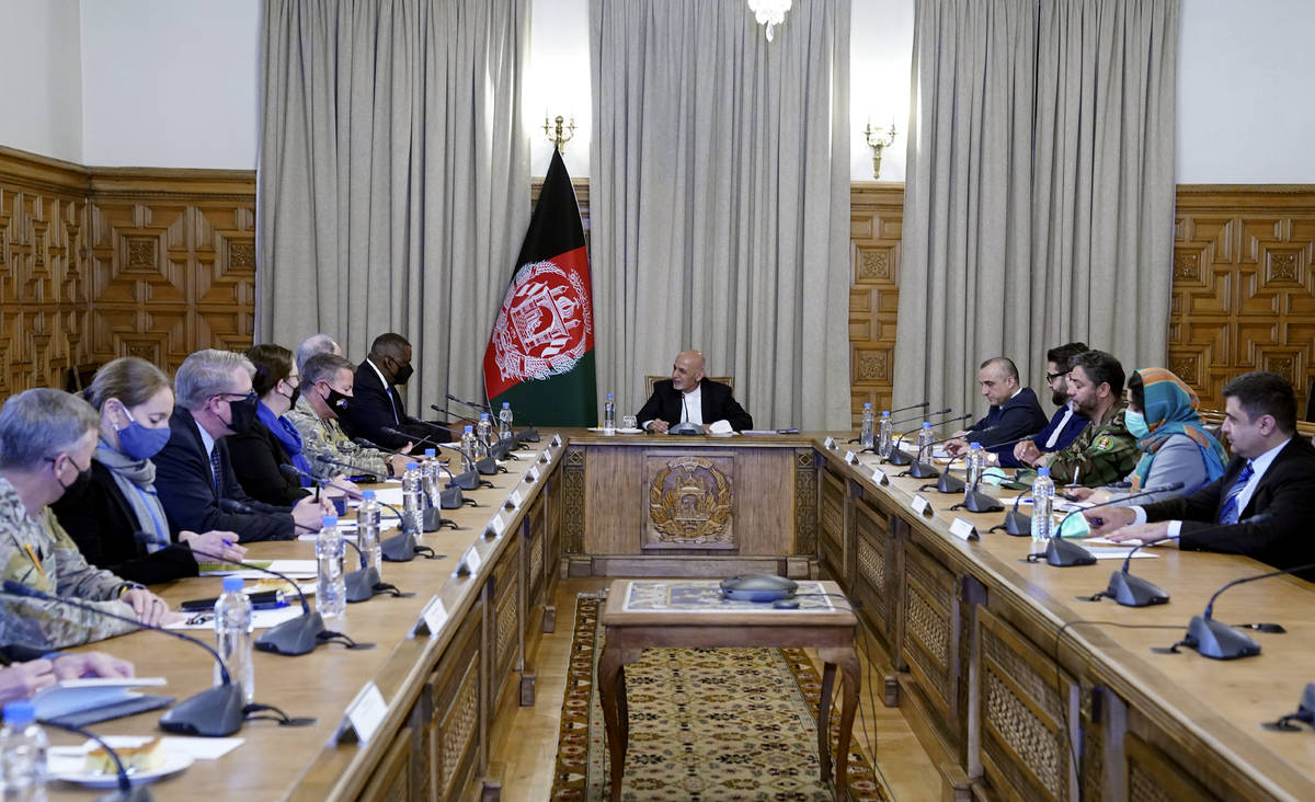 Afgan President Ashraf Ghani, center, meets with U.S. Defense Secretary Lloyd Austin, center le ...