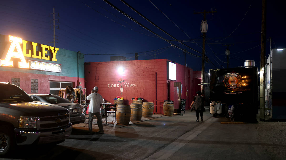 People arrive on reopening night at Cork and Thorn in downtown Las Vegas Sunday, March 21, 2021 ...