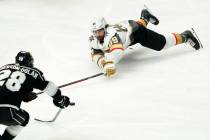 Los Angeles Kings center Jaret Anderson-Dolan, left, and Vegas Golden Knights right wing Alex T ...