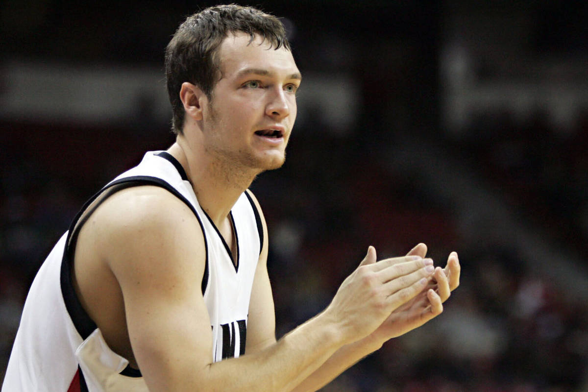 UNLV guard Kevin Kruger encourages his teammates during the second half of the Rebel's 74-59 vi ...