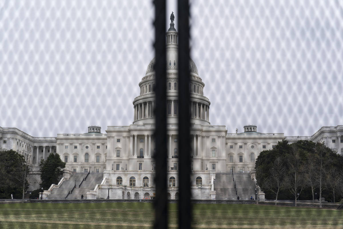 An inner perimeter anti-scaling fence is around the U.S. Capitol, Tuesday, March 16, 2021, in W ...