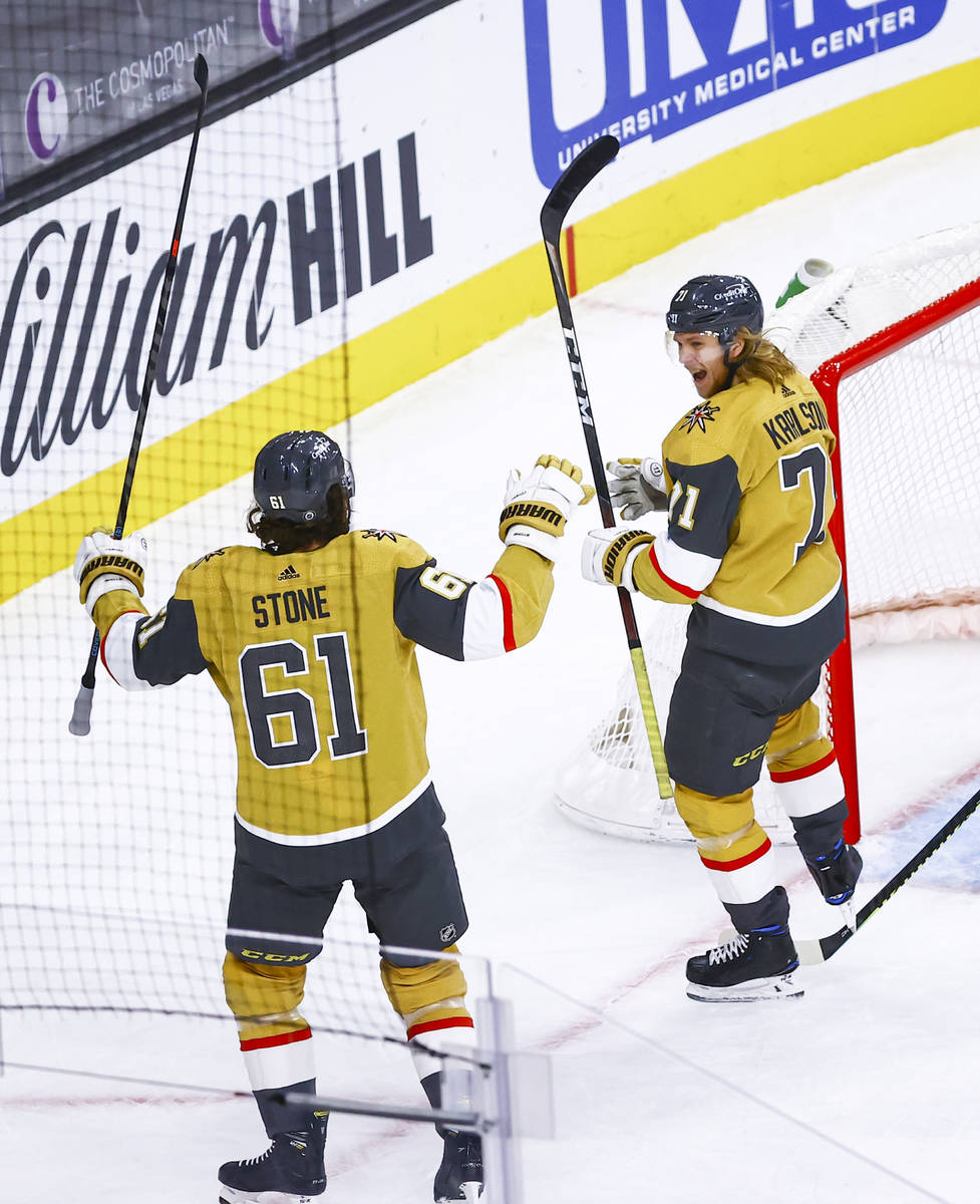 Golden Knights' William Karlsson (71) celebrates his goal after scoring against the St. Louis B ...
