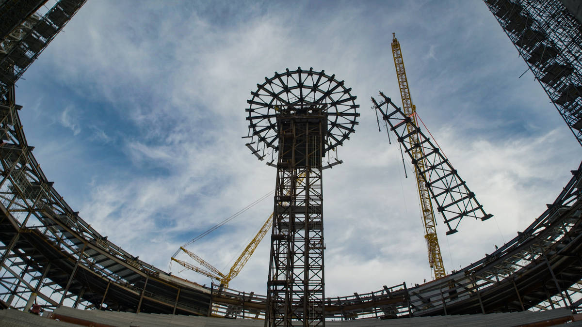 The second of 32 massive roof trusses, weighing more than 100 tons apiece, being put in place o ...