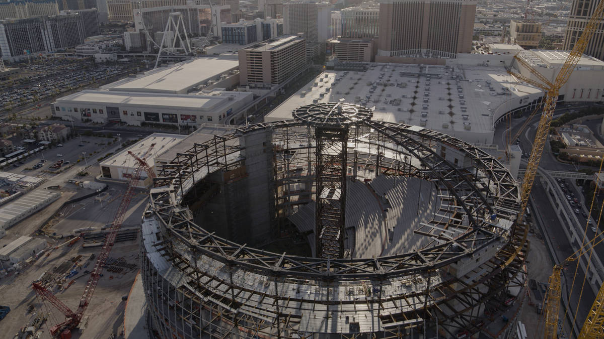 The second of 32 massive roof trusses, weighing more than 100 tons apiece, being put in place o ...