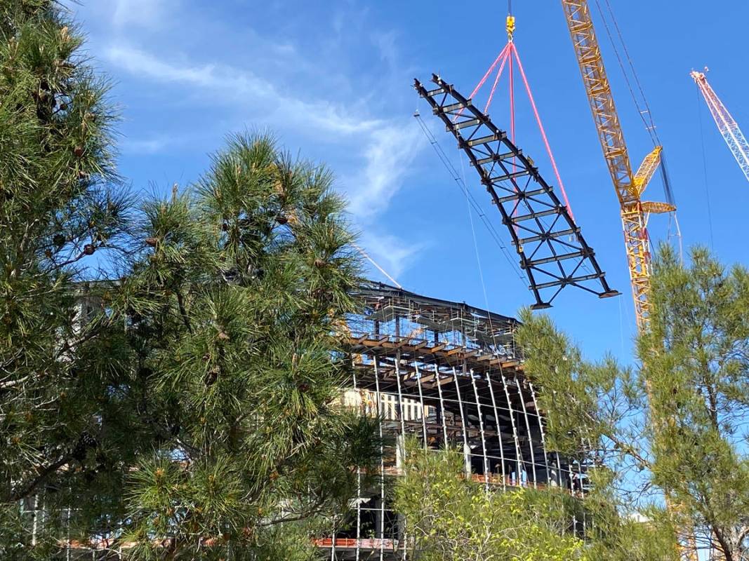The second of 32 massive roof trusses, weighing more than 100 tons apiece, being put in place o ...