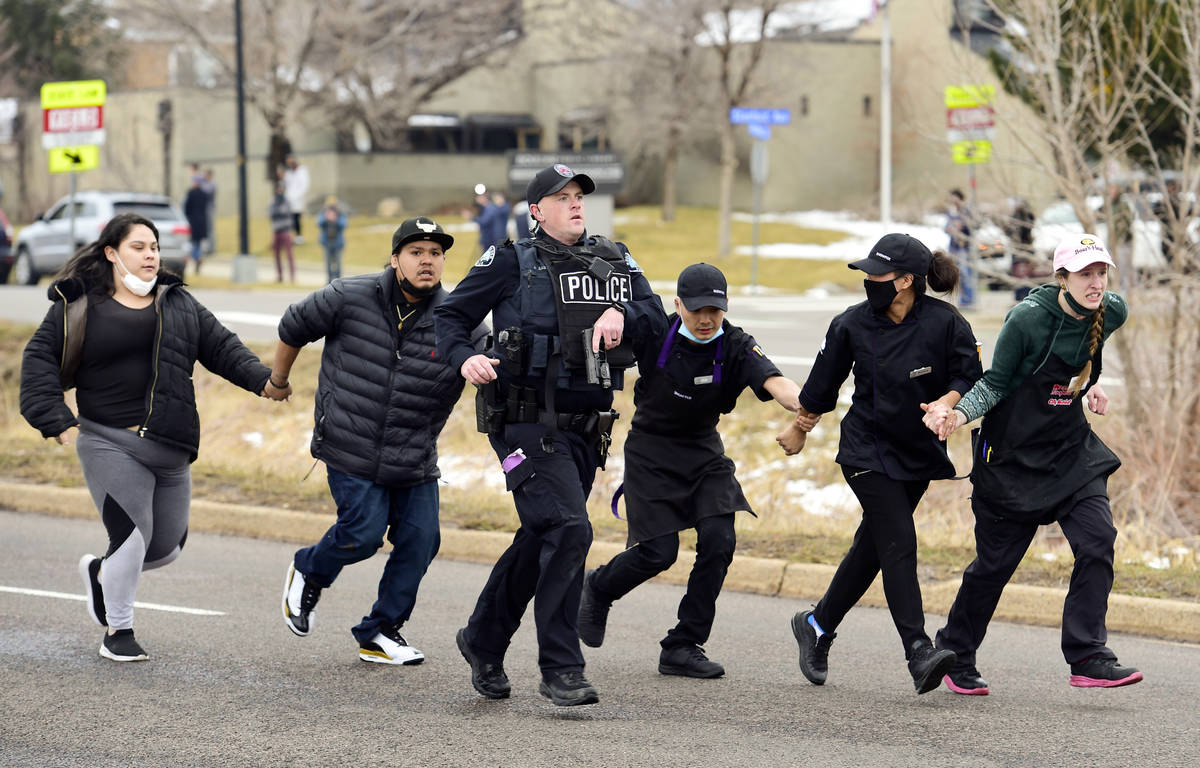 King Soopers employees and customers run down Table Mesa Drive in Boulder after reports of shot ...