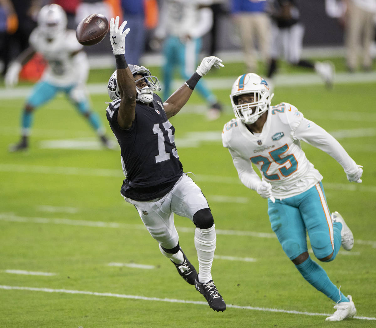 Raiders wide receiver Nelson Agholor (15) dives to try and make a catch over Miami Dolphins cor ...