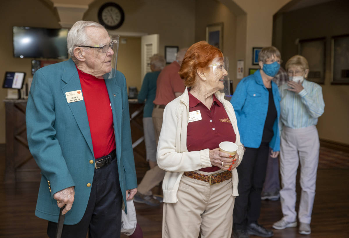 Seniors including Jerry and Kay Harmon, who were recently vaccinated, are reunited with their f ...