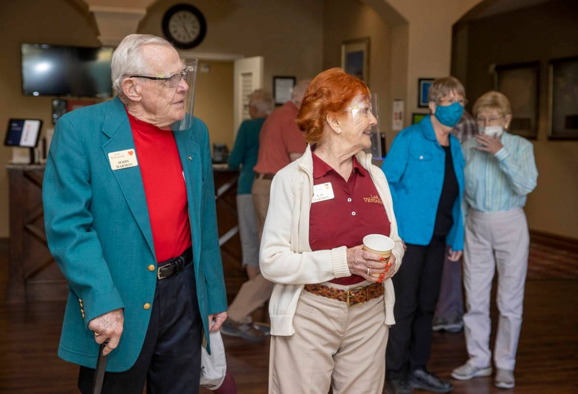 Seniors including Jerry and Kay Harmon, who were recently vaccinated, are reunited with their f ...
