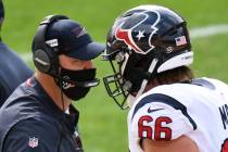 Houston Texans head coach Bill O'Brien, left, talks with center Nick Martin (66) on the sidelin ...