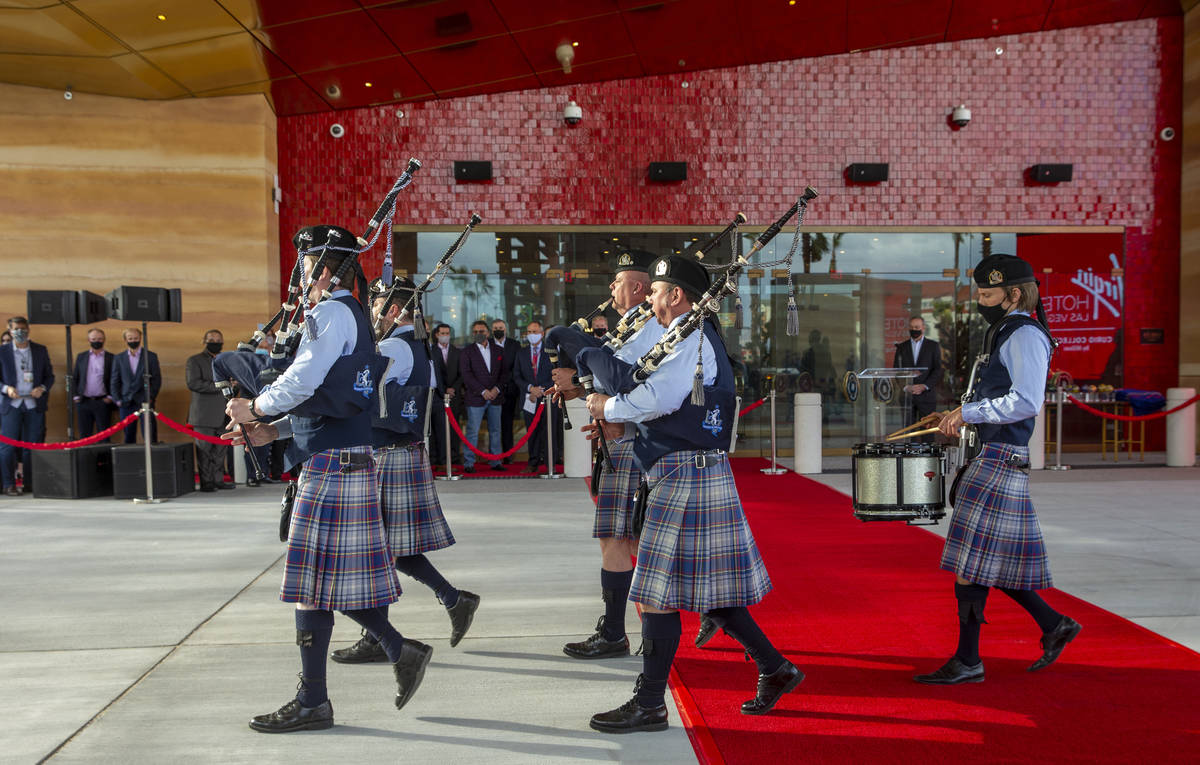 Bagpipers arrive to play for invited guests during the Virgin Hotels Las Vegas opening ceremoni ...