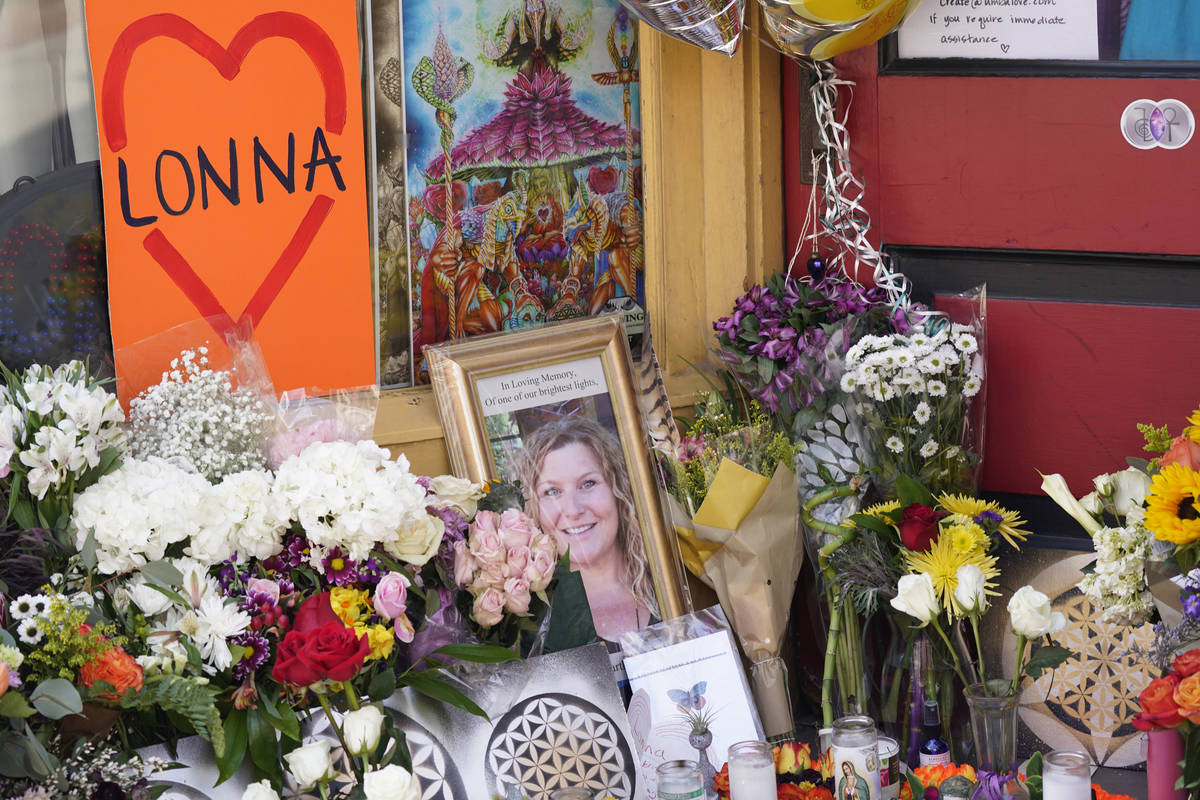 A tribute is displayed outside the store owned by one of 10 victims in the mass shooting at a K ...