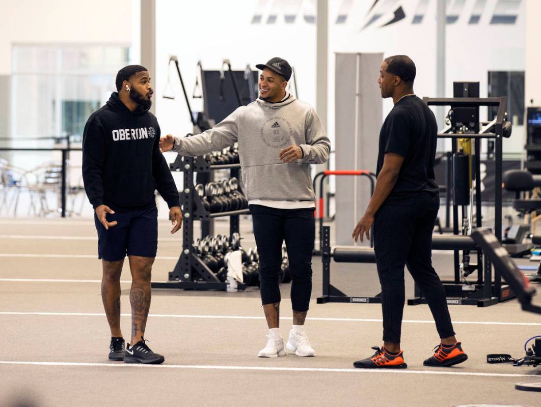 Las Vegas Raiders cornerback Keisean Nixon, left, and safety Johnathan Abram and Deon Hodges, h ...