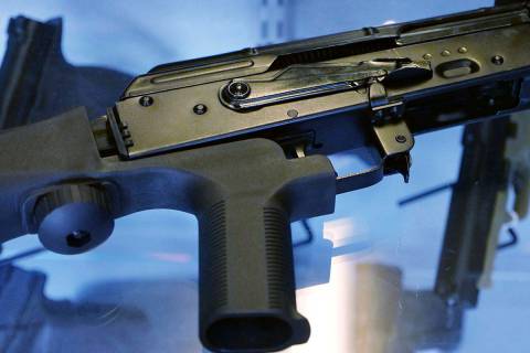 FThis Oct. 4, 2017 file photo shows a device called a "bump stock" attached to a semi-automatic ...