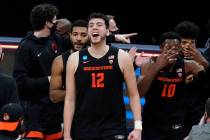 Oregon State center Roman Silva (12) celebrates after a Sweet 16 game against Loyola Chicago in ...
